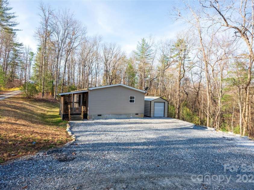 140 Adams Drive, Brevard, NC 28712.  MLS# CAR4233385, YatesRealty ID 15849. 
