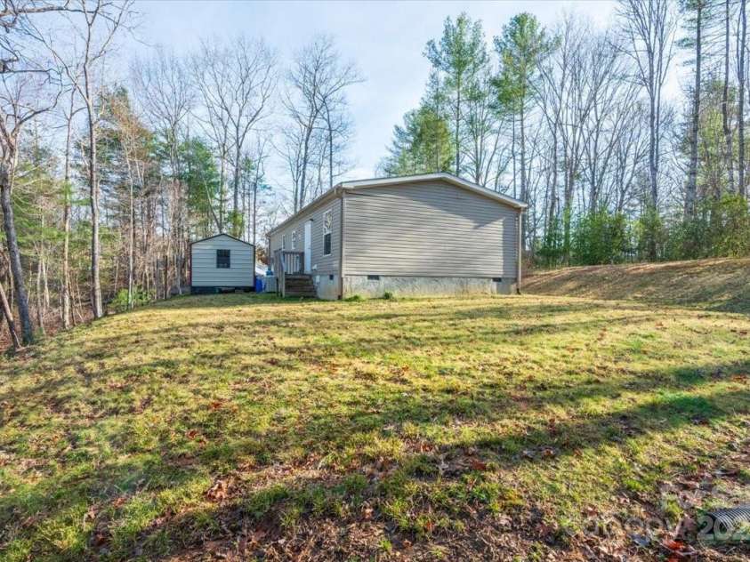 140 Adams Drive, Brevard, NC 28712.  MLS# CAR4233385, YatesRealty ID 15849. 