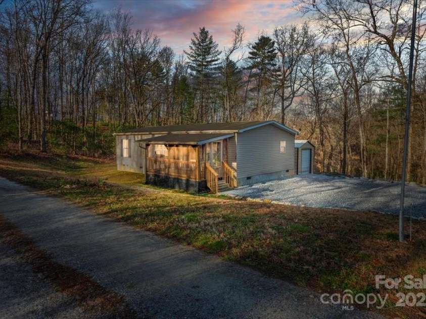 140 Adams Drive, Brevard, NC 28712.  MLS# CAR4233385, YatesRealty ID 15849. 