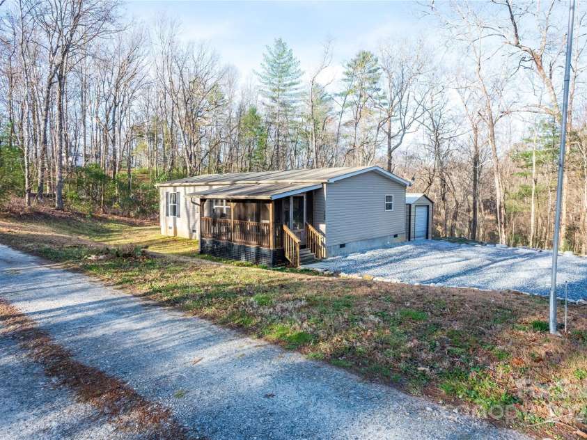 140 Adams Drive, Brevard, NC 28712.  MLS# CAR4233385, YatesRealty ID 15849. 