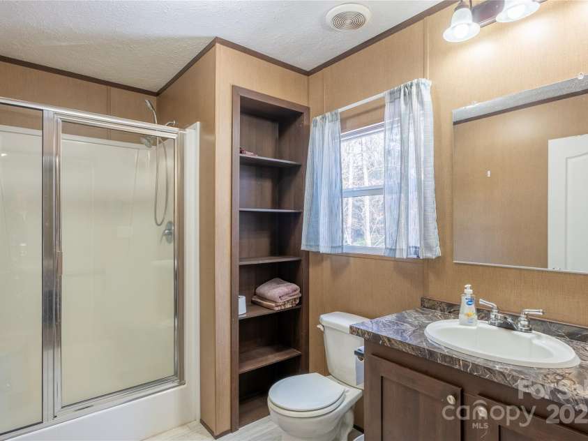 140 Adams Drive, Brevard, NC 28712.  MLS# CAR4233385, YatesRealty ID 15849. 