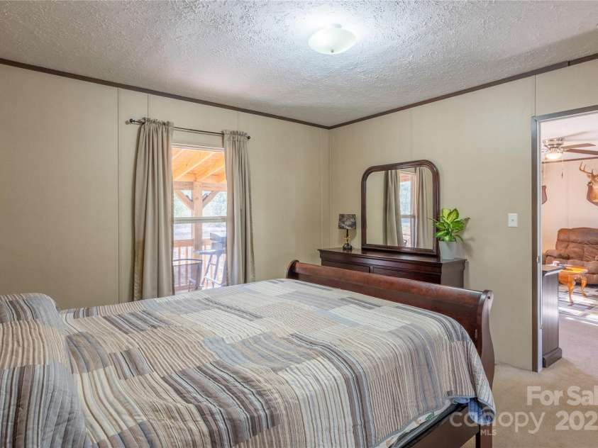 140 Adams Drive, Brevard, NC 28712.  MLS# CAR4233385, YatesRealty ID 15849. 