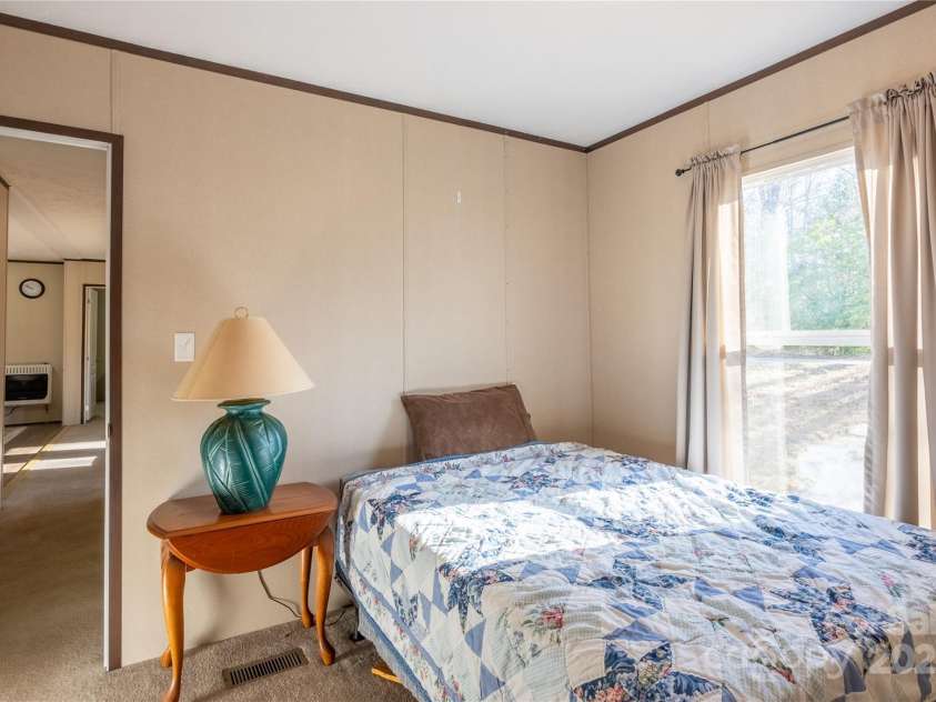 140 Adams Drive, Brevard, NC 28712.  MLS# CAR4233385, YatesRealty ID 15849. 