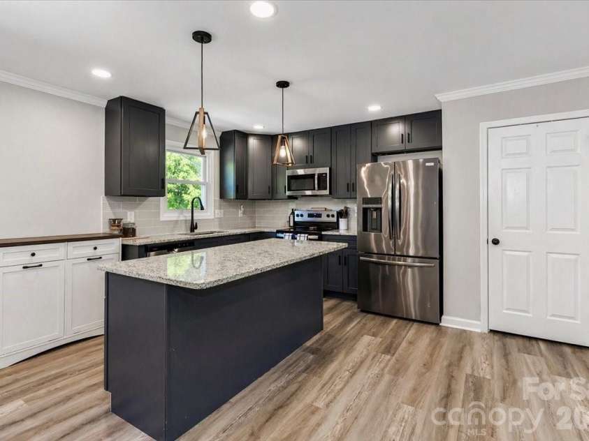 222 Cliffside Drive, Kannapolis, NC 28081.  MLS# CAR4370117, YatesRealty ID 15854. Kitchen has pantry