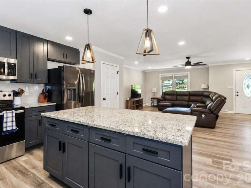 222 Cliffside Drive, Kannapolis, NC 28081.  MLS# CAR4370117, YatesRealty ID 15854. Kitchen looking into living room
