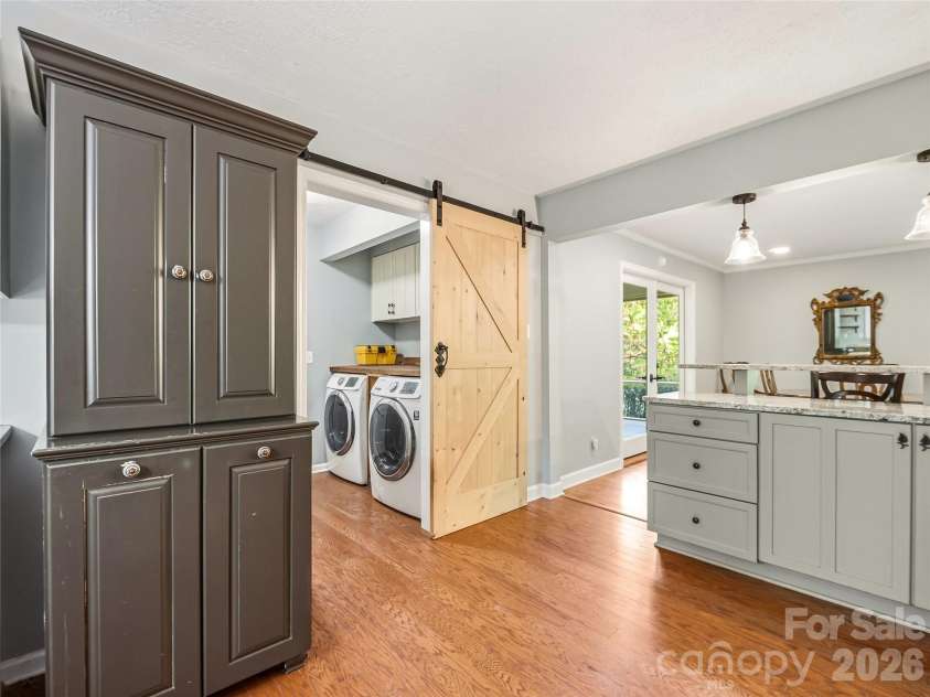 100 Hummingbird Lane, Columbus, NC 28722.  MLS# CAR4373226, YatesRealty ID 15857. Laundry room off kitchen
