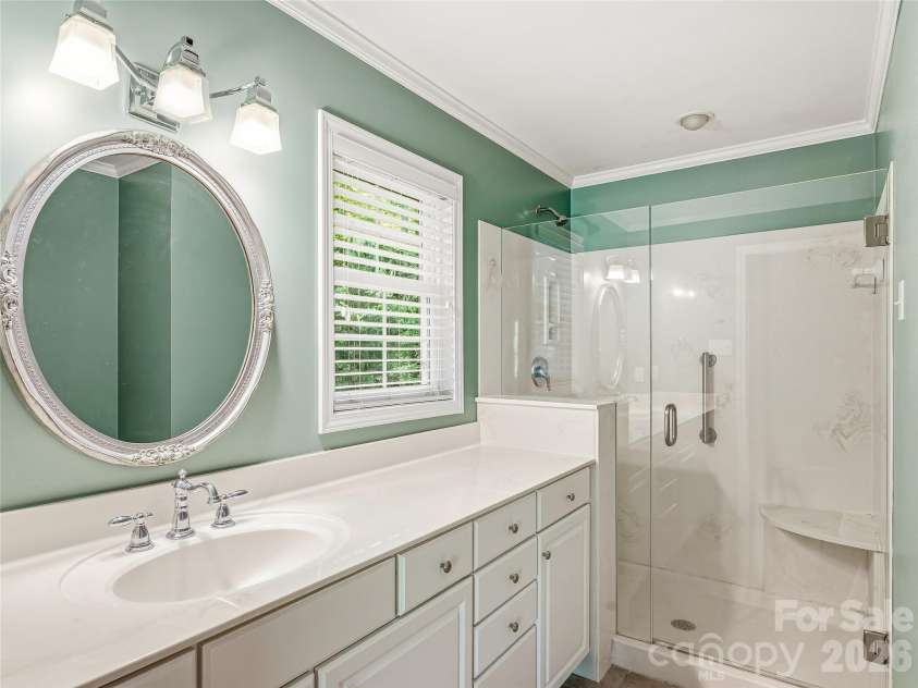 100 Hummingbird Lane, Columbus, NC 28722.  MLS# CAR4373226, YatesRealty ID 15857. Primary ensuite