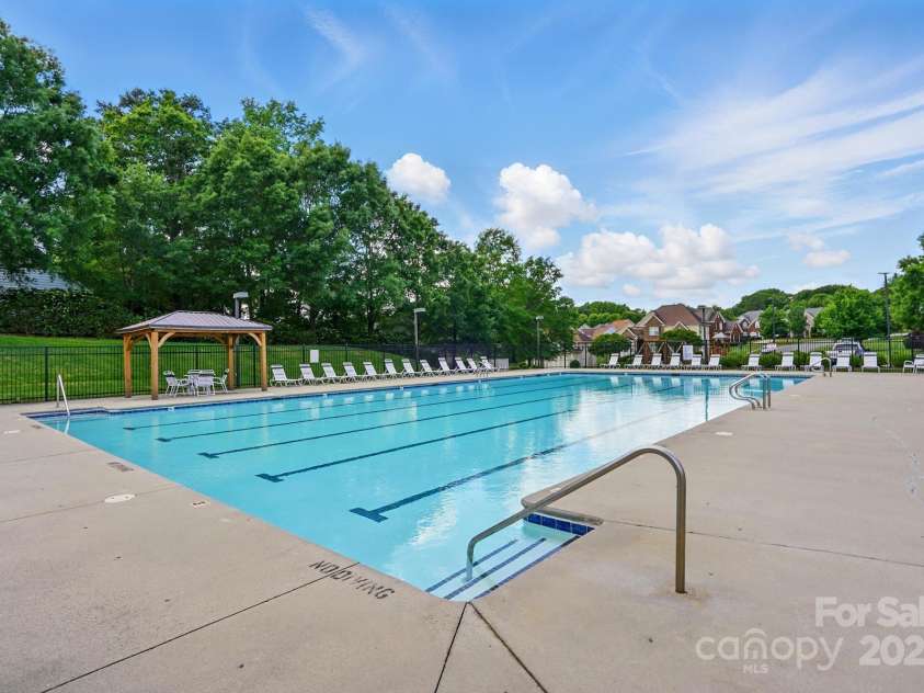 8833 Cavonnier Lane, Charlotte, NC 28216.  MLS# CAR4254092, YatesRealty ID 15858. Community pool