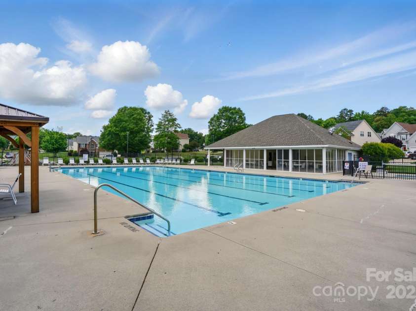 8833 Cavonnier Lane, Charlotte, NC 28216.  MLS# CAR4254092, YatesRealty ID 15858. Community pool