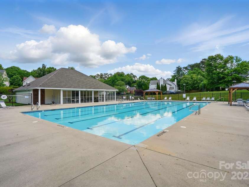 8833 Cavonnier Lane, Charlotte, NC 28216.  MLS# CAR4254092, YatesRealty ID 15858. Community pool