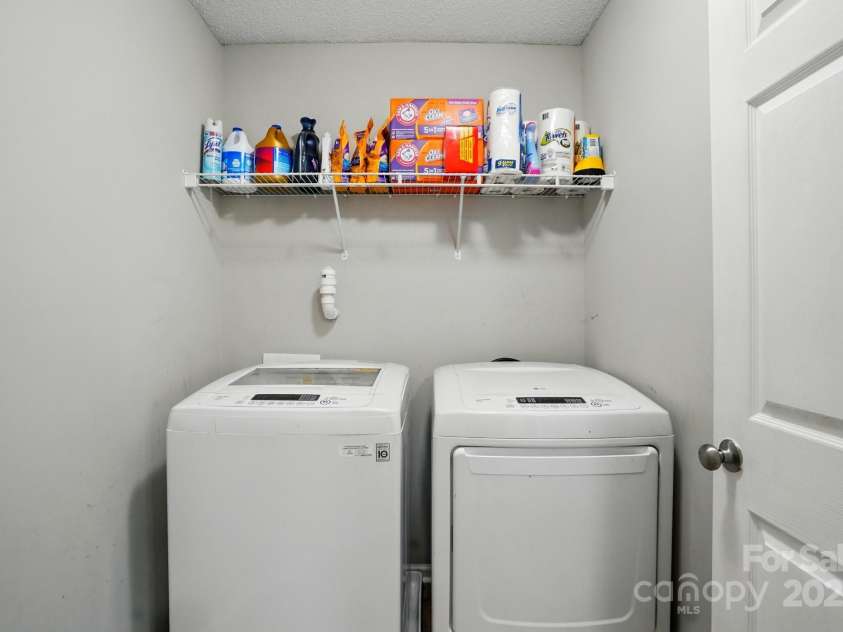 8833 Cavonnier Lane, Charlotte, NC 28216.  MLS# CAR4254092, YatesRealty ID 15858. Laundry room