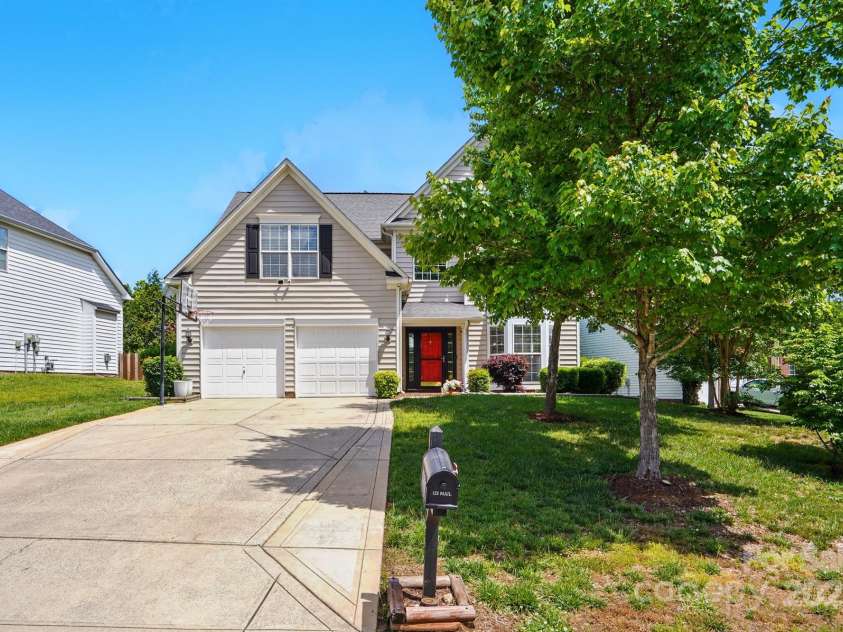8833 Cavonnier Lane, Charlotte, NC 28216.  MLS# CAR4254092, YatesRealty ID 15858. Widened driveway for additional parking