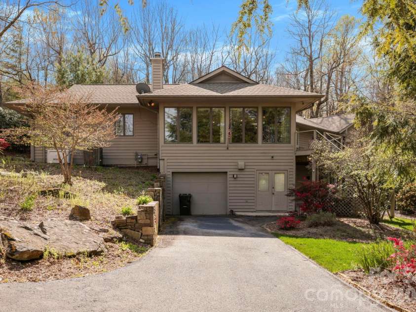 100 Elmridge Drive, Flat Rock, NC 28731.  MLS# CAR4366738, YatesRealty ID 15859. Additional single garage in basement