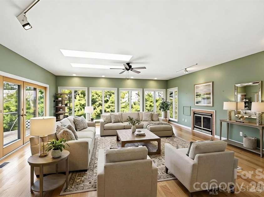 100 Elmridge Drive, Flat Rock, NC 28731.  MLS# CAR4366738, YatesRealty ID 15859. Den virtually staged