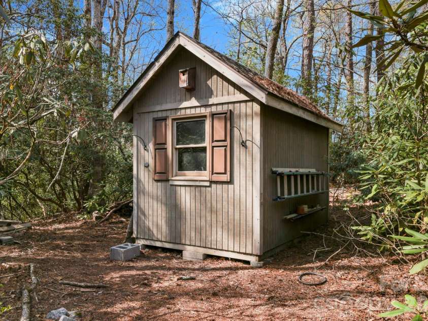 100 Elmridge Drive, Flat Rock, NC 28731.  MLS# CAR4366738, YatesRealty ID 15859. Garden shed included