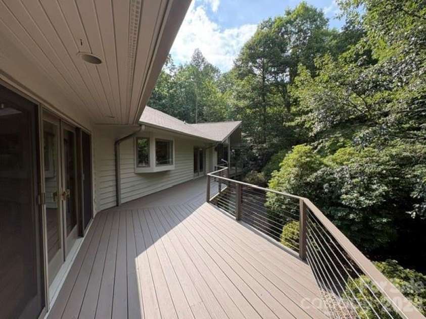 100 Elmridge Drive, Flat Rock, NC 28731.  MLS# CAR4366738, YatesRealty ID 15859. Newly painted back deck