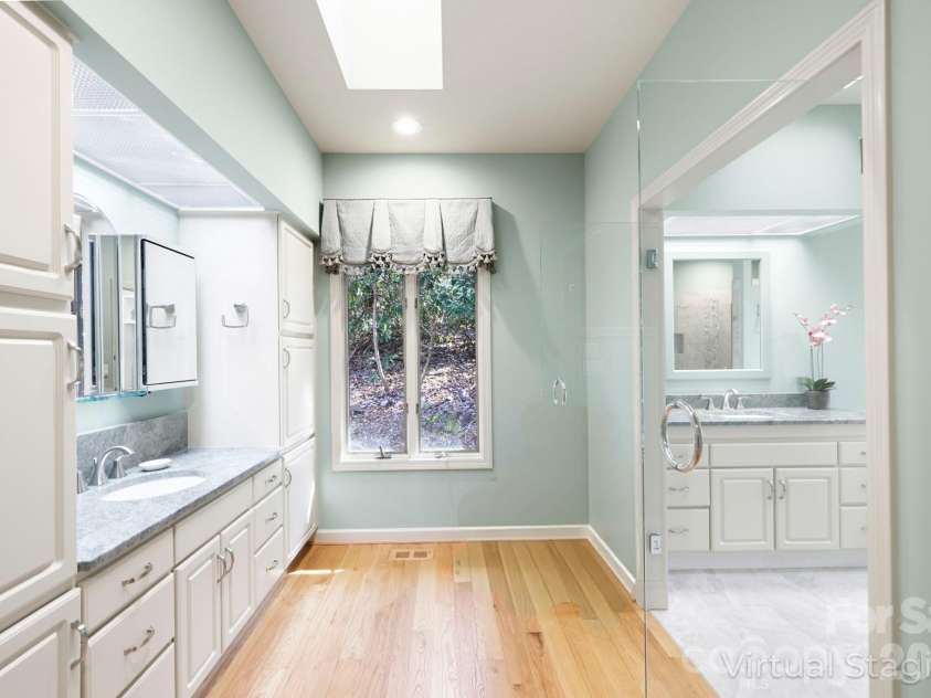 100 Elmridge Drive, Flat Rock, NC 28731.  MLS# CAR4366738, YatesRealty ID 15859. Primary bath dressing area