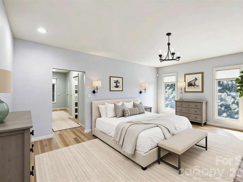 100 Elmridge Drive, Flat Rock, NC 28731.  MLS# CAR4366738, YatesRealty ID 15859. Primary bedroom virtually staged