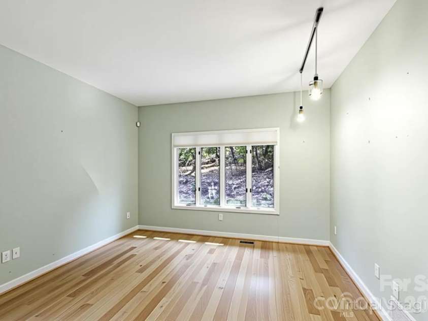 100 Elmridge Drive, Flat Rock, NC 28731.  MLS# CAR4366738, YatesRealty ID 15859. Second upstairs bedroom