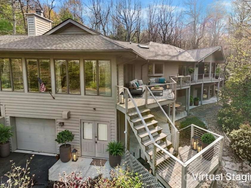 100 Elmridge Drive, Flat Rock, NC 28731.  MLS# CAR4366738, YatesRealty ID 15859. Virtually staged back deck overlooking nature