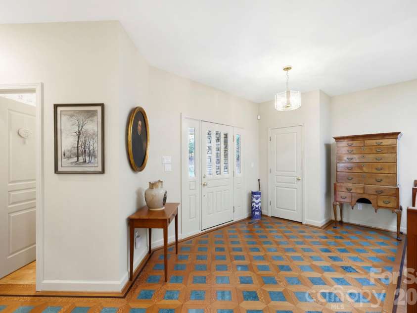 100 Elmridge Drive, Flat Rock, NC 28731.  MLS# CAR4366738, YatesRealty ID 15859. Welcoming foyer with 