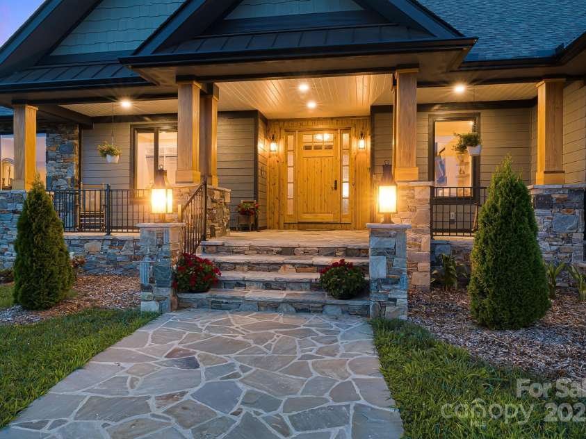 360 Turkey Branch Road, Mars Hill, NC 28754.  MLS# CAR4218460, YatesRealty ID 1586. Covered front porch for sunrise & sunset viewing.