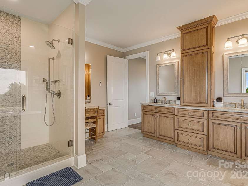 360 Turkey Branch Road, Mars Hill, NC 28754.  MLS# CAR4218460, YatesRealty ID 1586. Dual vanities & dressing table.