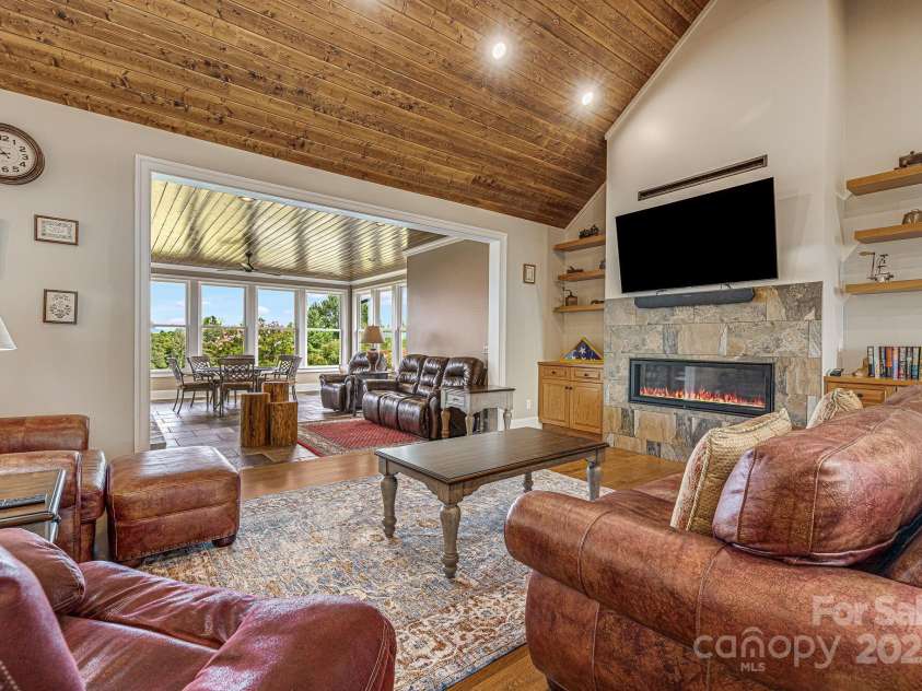 360 Turkey Branch Road, Mars Hill, NC 28754.  MLS# CAR4218460, YatesRealty ID 1586. Living room with gas  fireplace.
