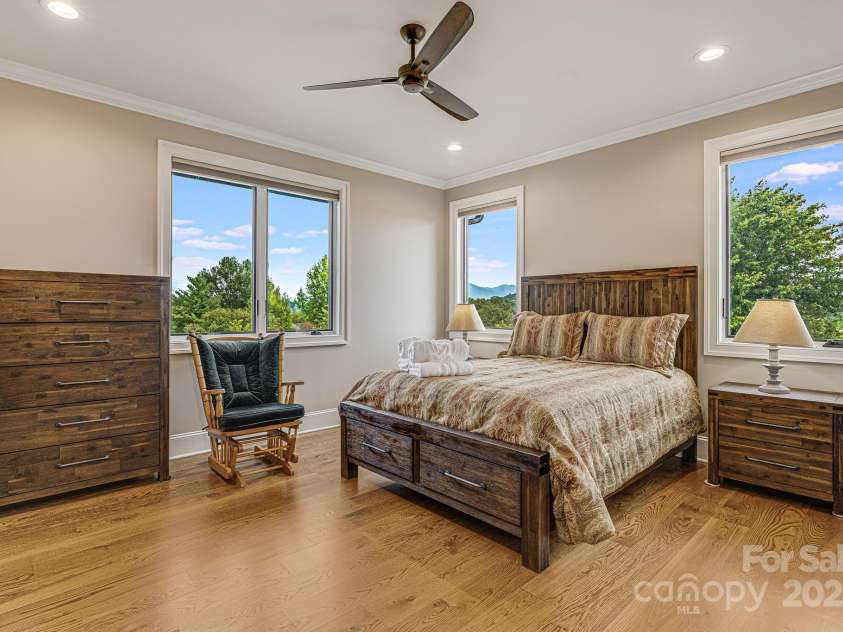 360 Turkey Branch Road, Mars Hill, NC 28754.  MLS# CAR4218460, YatesRealty ID 1586. Main level second bedroom with ensuite bath.