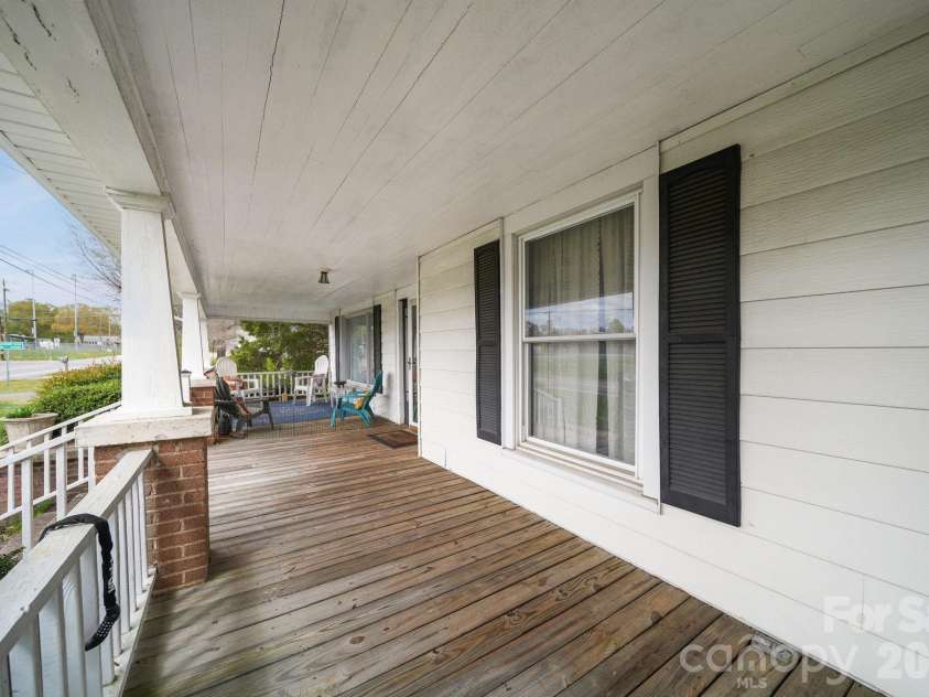 333 Main Street, Mount Pleasant, NC 28124.  MLS# CAR4358646, YatesRealty ID 15861. Front facing covered wrap-around porch.