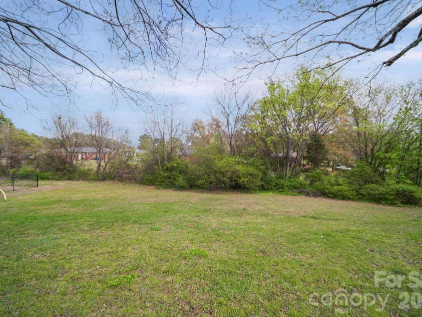 333 Main Street, Mount Pleasant, NC 28124.  MLS# CAR4358646, YatesRealty ID 15861. Large backyard partially fenced for all your needs.