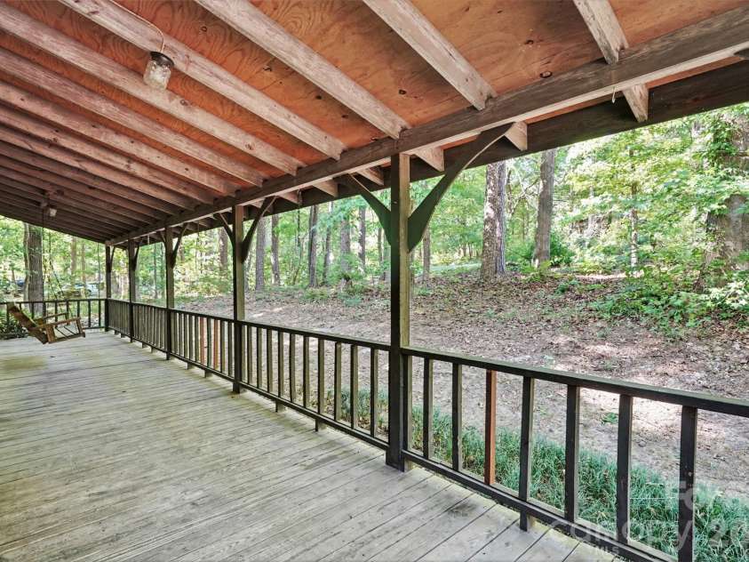 5921 Senconee Road, Matthews, NC 28104.  MLS# CAR4372440, YatesRealty ID 15862. 