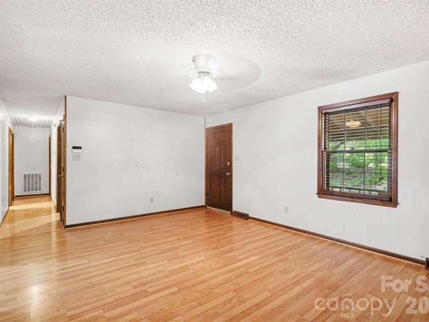 5921 Senconee Road, Matthews, NC 28104.  MLS# CAR4372440, YatesRealty ID 15862. 