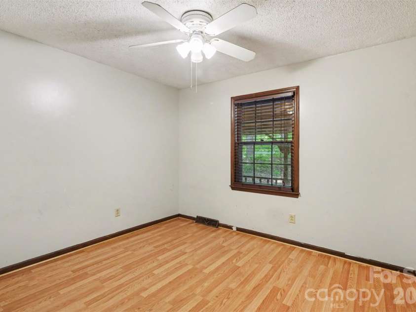 5921 Senconee Road, Matthews, NC 28104.  MLS# CAR4372440, YatesRealty ID 15862. 