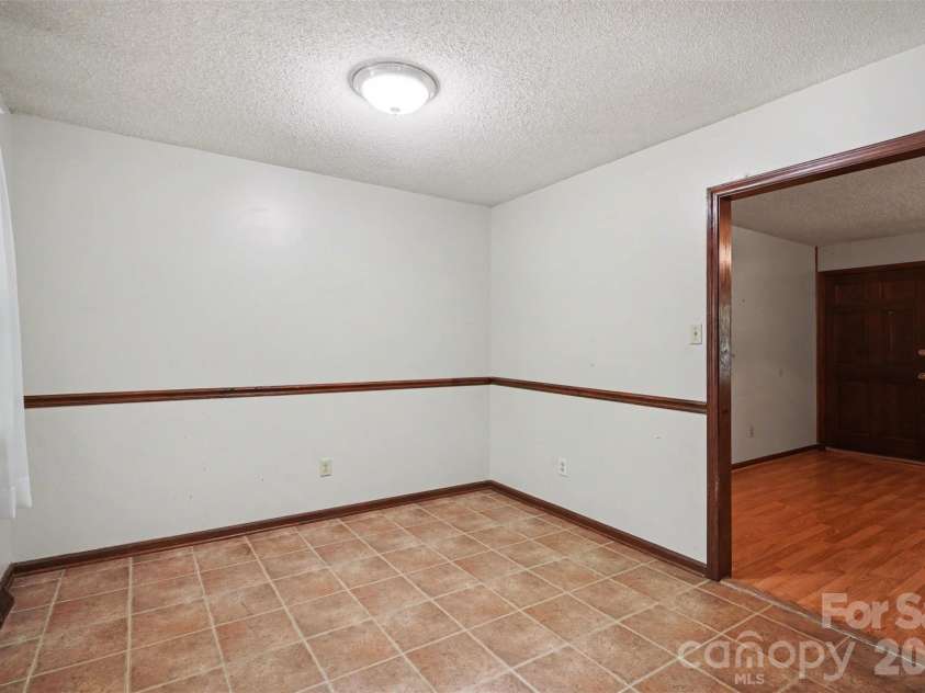 5921 Senconee Road, Matthews, NC 28104.  MLS# CAR4372440, YatesRealty ID 15862. 