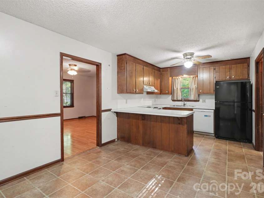 5921 Senconee Road, Matthews, NC 28104.  MLS# CAR4372440, YatesRealty ID 15862. 