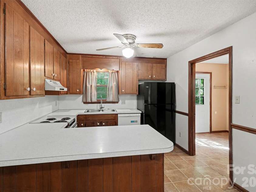 5921 Senconee Road, Matthews, NC 28104.  MLS# CAR4372440, YatesRealty ID 15862. 