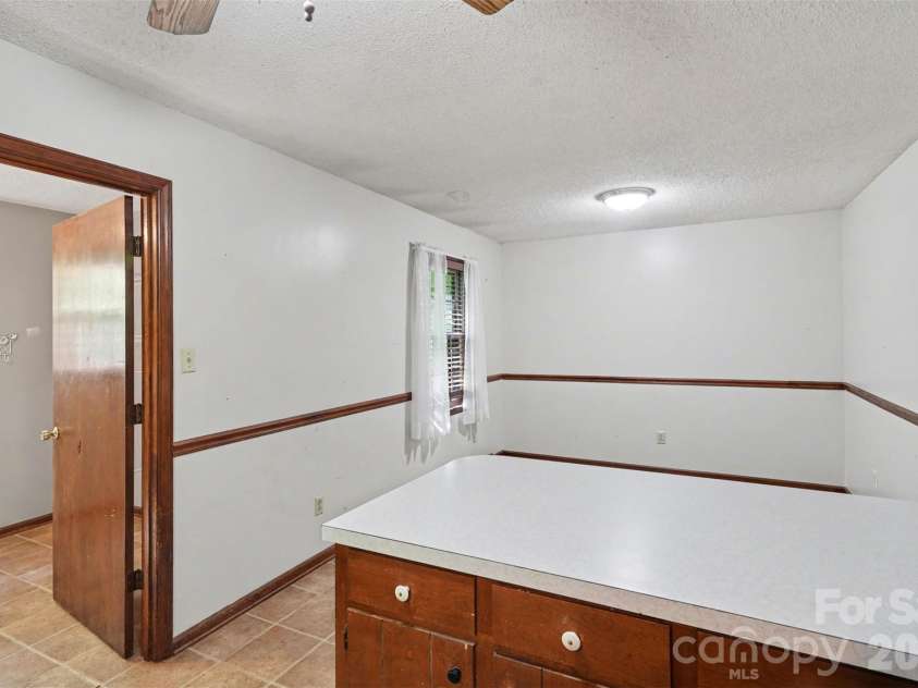 5921 Senconee Road, Matthews, NC 28104.  MLS# CAR4372440, YatesRealty ID 15862. 