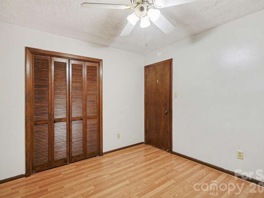 5921 Senconee Road, Matthews, NC 28104.  MLS# CAR4372440, YatesRealty ID 15862. 