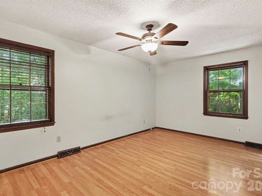 5921 Senconee Road, Matthews, NC 28104.  MLS# CAR4372440, YatesRealty ID 15862. 