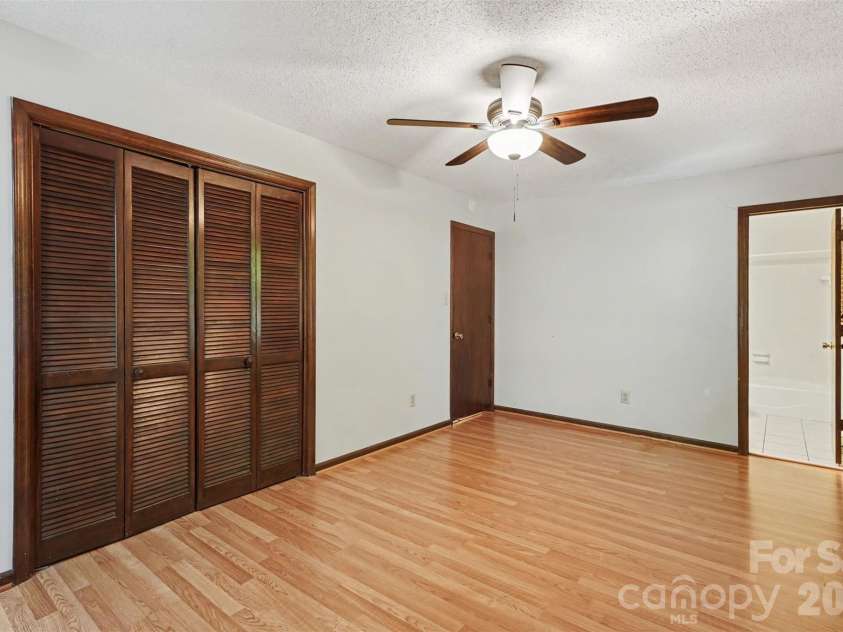 5921 Senconee Road, Matthews, NC 28104.  MLS# CAR4372440, YatesRealty ID 15862. 