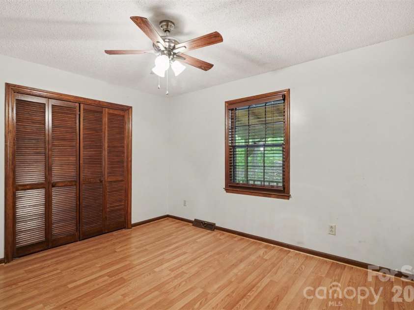 5921 Senconee Road, Matthews, NC 28104.  MLS# CAR4372440, YatesRealty ID 15862. 