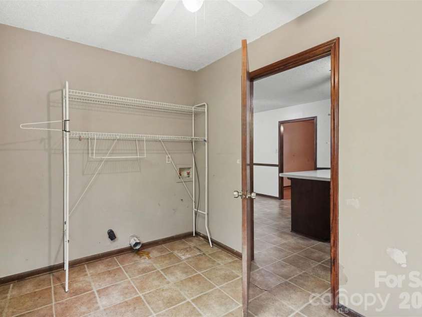 5921 Senconee Road, Matthews, NC 28104.  MLS# CAR4372440, YatesRealty ID 15862. 