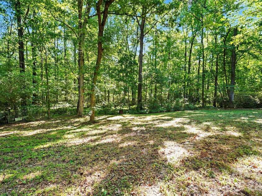 5921 Senconee Road, Matthews, NC 28104.  MLS# CAR4372440, YatesRealty ID 15862. 