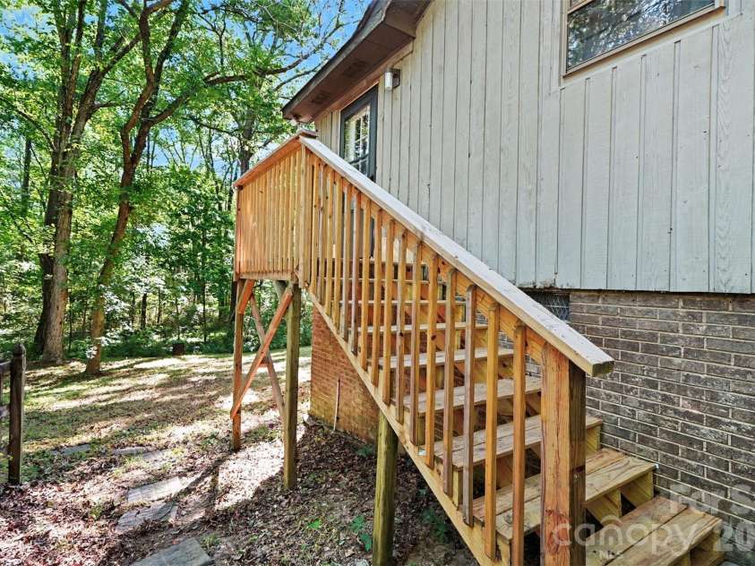 5921 Senconee Road, Matthews, NC 28104.  MLS# CAR4372440, YatesRealty ID 15862. 