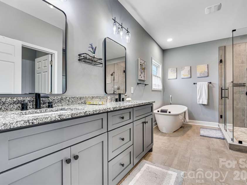 1181 Kensington Circle, Newton, NC 28658.  MLS# CAR4361179, YatesRealty ID 15864. Primary bathroom