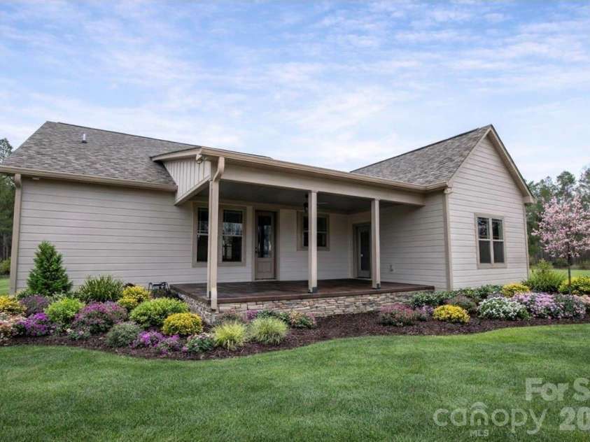 1070 Castle Mill Lane, Salisbury, NC 28145.  MLS# CAR4275471, YatesRealty ID 15868. What back porch could look like with landscaping