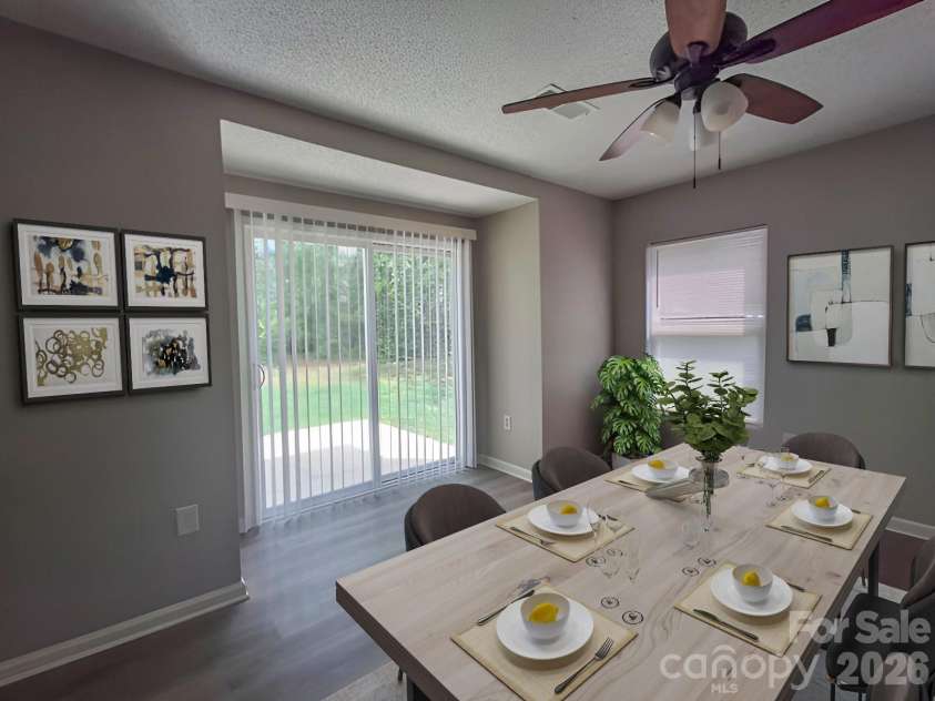 10242 Hugue Way, Charlotte, NC 28214.  MLS# CAR4372346, YatesRealty ID 15869. Dining Room (virtually staged)
