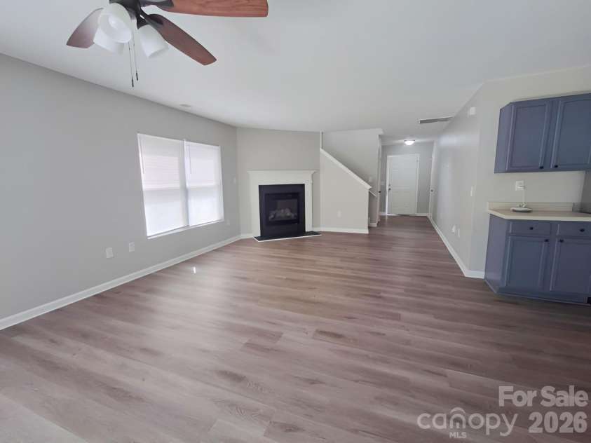 10242 Hugue Way, Charlotte, NC 28214.  MLS# CAR4372346, YatesRealty ID 15869. Living Room Angle 2