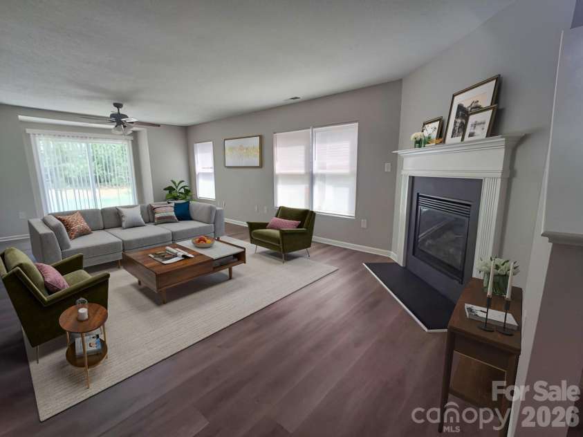 10242 Hugue Way, Charlotte, NC 28214.  MLS# CAR4372346, YatesRealty ID 15869. Living Room (virtually staged)